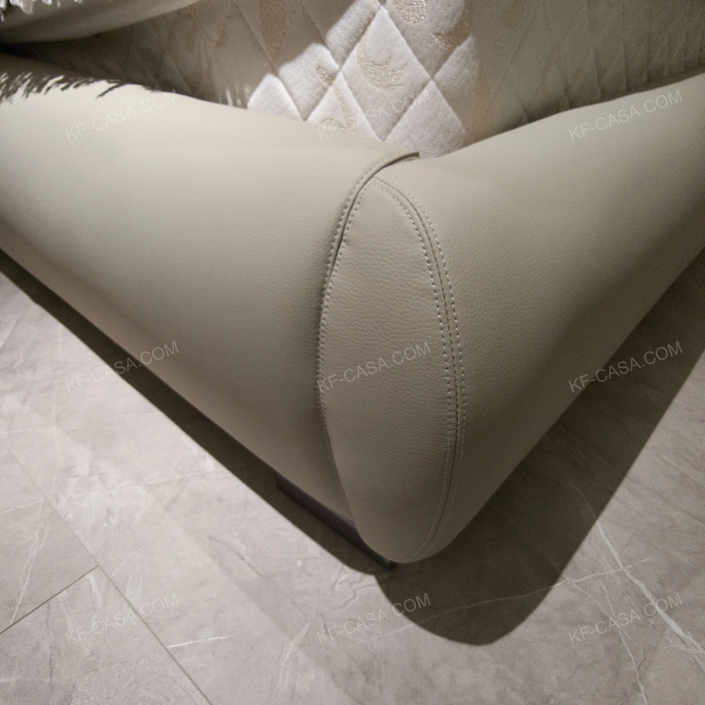 Warm Taupe Upholstered Bed with Tiered Headboard, Lacing Detail & Stainless Steel Accents